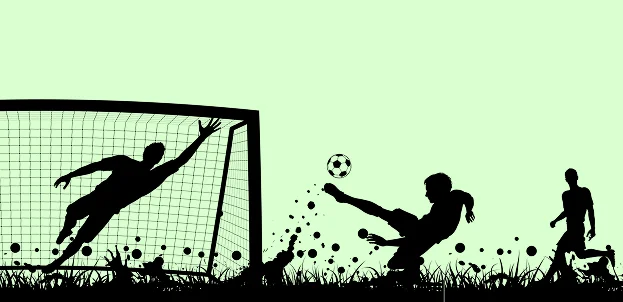 Silhouette of a football player kicking a ball, representing competitive football, athletic performance, and match action.
